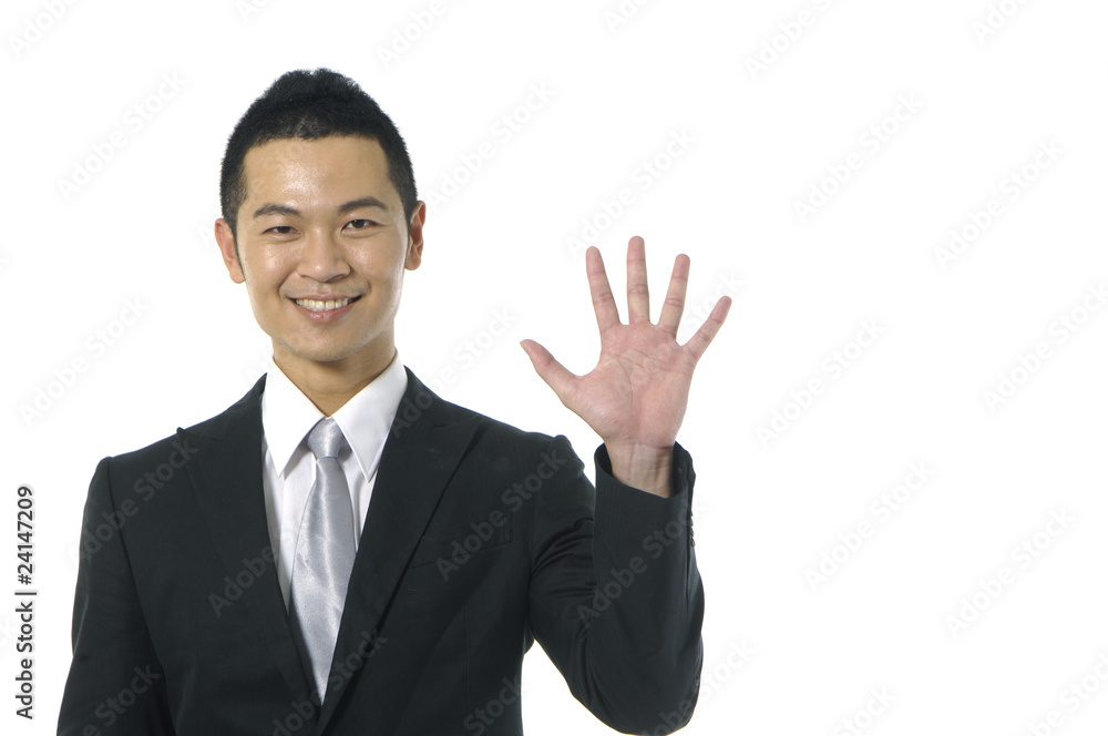 Businessman giving warning on isolated background Businessman giving warning on isolated background