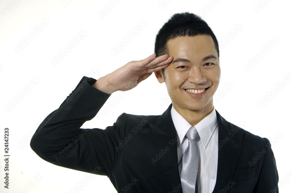 Asian young man by greeting gesture on white Asian young man by greeting gesture on white