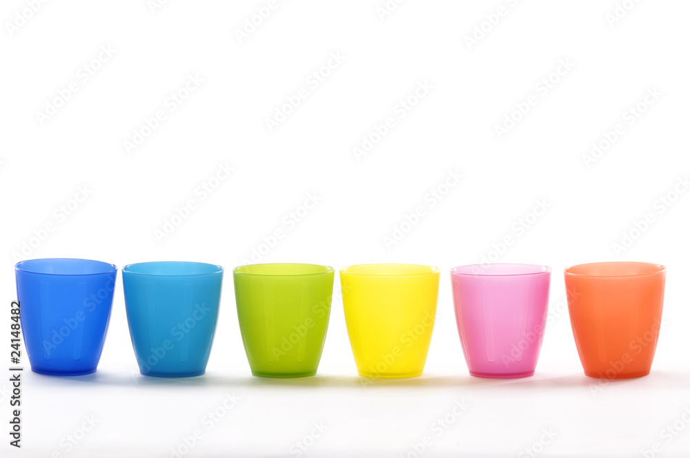 Plastic cups of various colours isolated on white Plastic cups of various colours isolated on white
