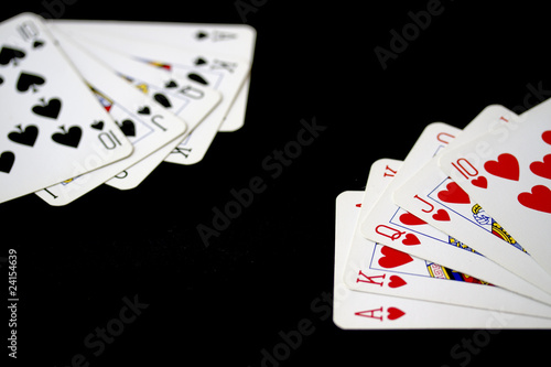 Poker Playing Cards on Black Background photo