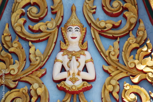 art on gable of temple, Wat Yod Maung Jaroen, Buriram photo