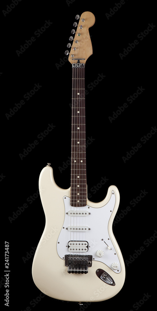 Fototapeta premium White electric guitar isolated against black background