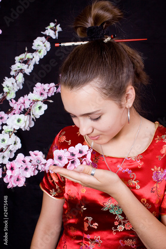 Young woman in red. Chinese styled. photo