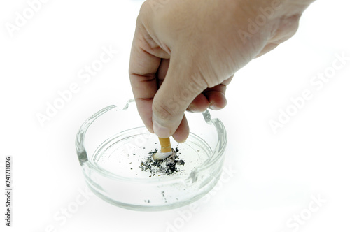 Stop Smoking,Hand putting out cigarette in ashtray