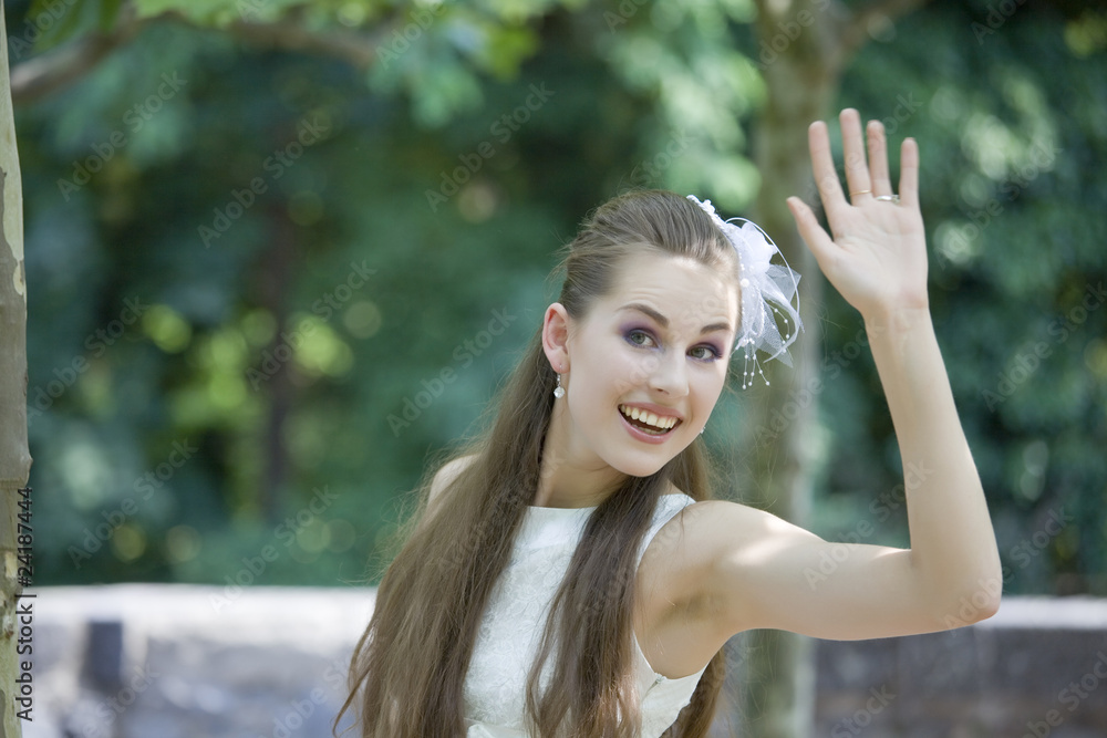 young bride waving with hand