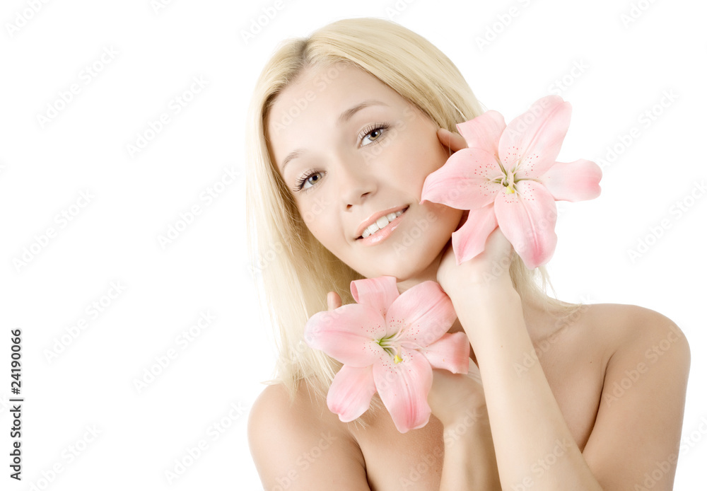 Beautiful woman with two pink lily smile isolated on white Beautiful woman with two pink lily smile isolated on white