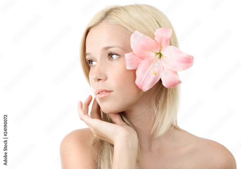 Beautiful sensual woman with pink lily smile isolated on white Beautiful sensual woman with pink lily smile isolated on white