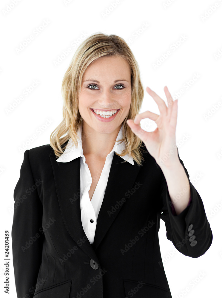 Successful businesswoman showing OK sign Successful businesswoman showing OK sign