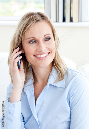 Captivating businesswoman using a mobile phone