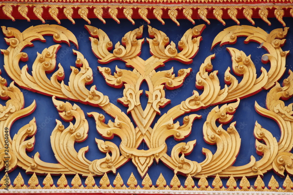Fototapeta premium art on gable of temple, Wat ban kor, Mahasarakam