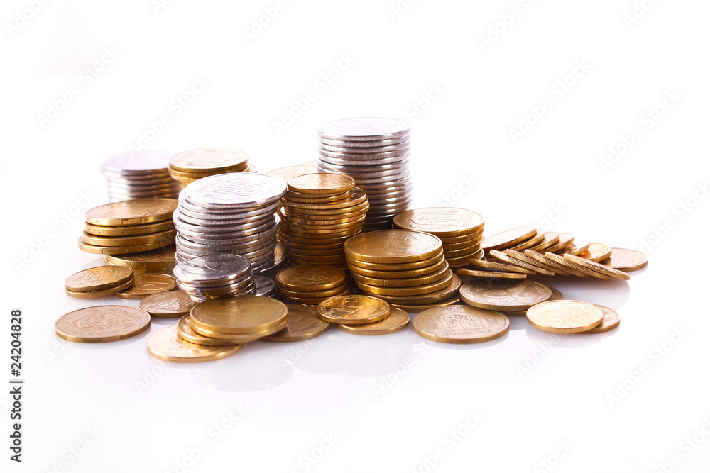 Many coins in column isolated on white Many coins in column isolated on white