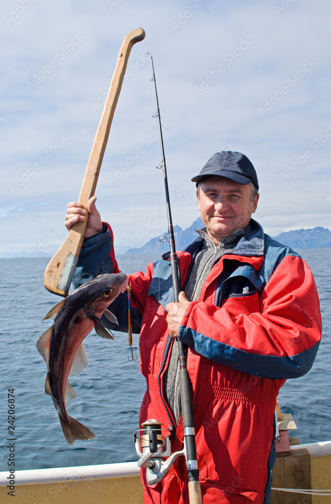Fototapeta premium Fisherman with fish