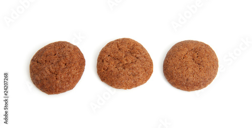 Home baked pepernoten cookies over white background