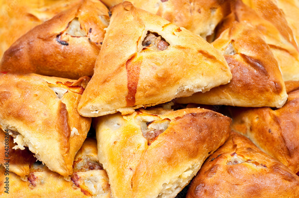 Traditional tatar potato and meat stuffed baked pastry isolated Traditional tatar potato and meat stuffed baked pastry isolated