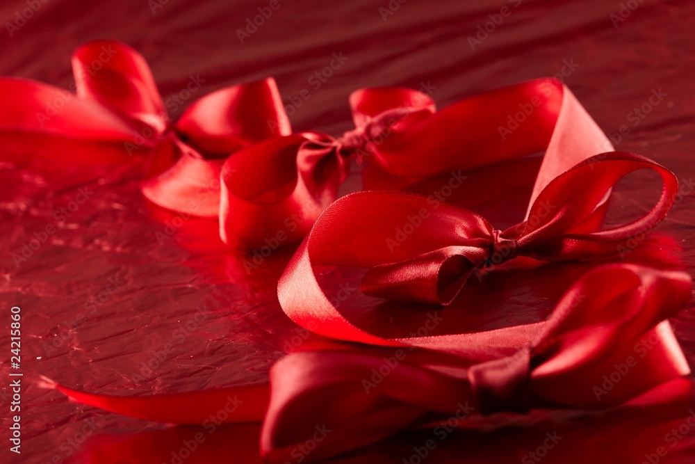 satin ribbons on the red background satin ribbons on the red background