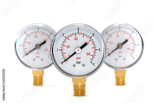 Three measuring devices on a white background