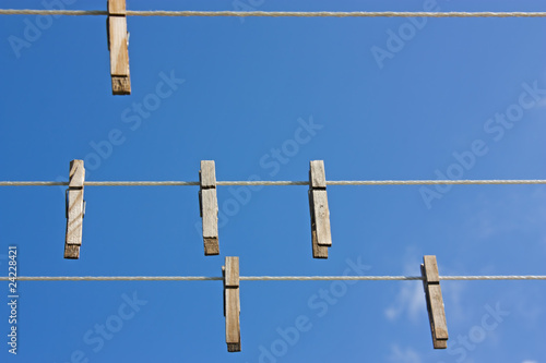 Clothes pegs on a washing line photo