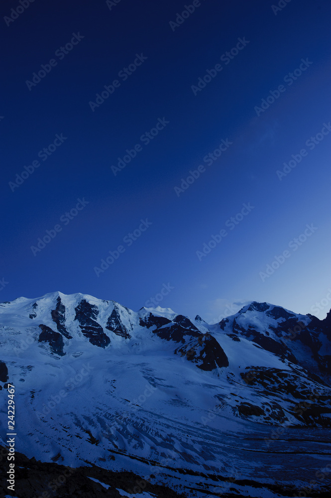 Piz Palu and Piz Bernina with Moteratsch glacier at dusk Piz Palu and Piz Bernina with Moteratsch glacier at dusk
