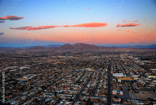 Photography Modern city with mountain at sunset
