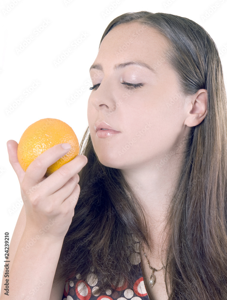 girl holds in a hand an orange girl holds in a hand an orange
