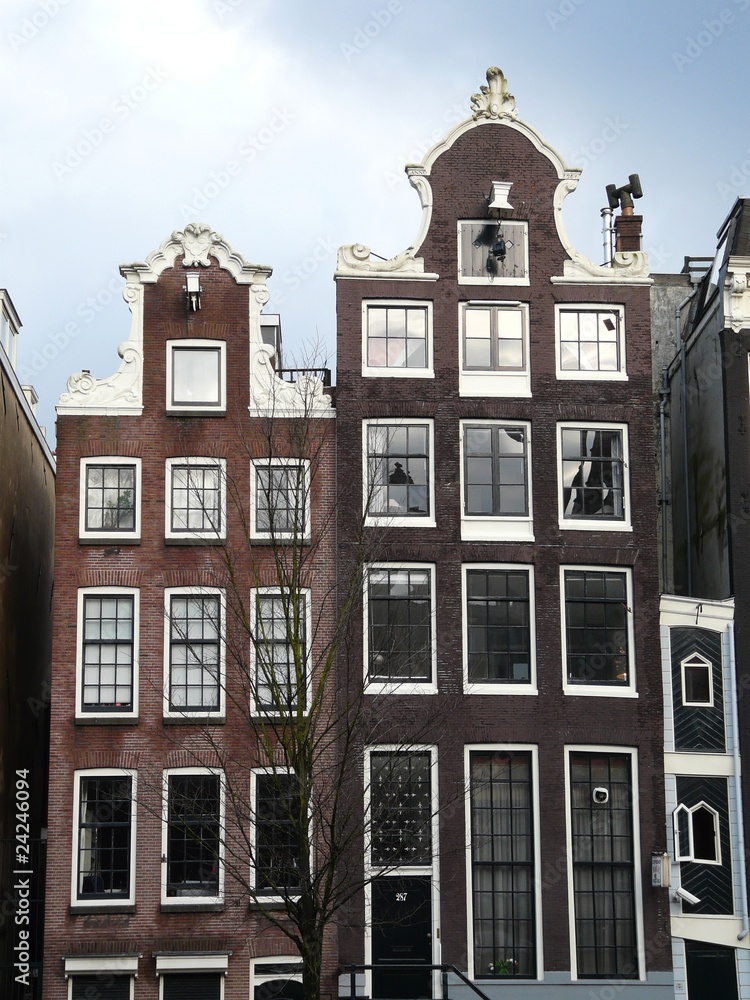 Fototapeta premium Old 17th and 18th century houses along the canals in Amsterdam