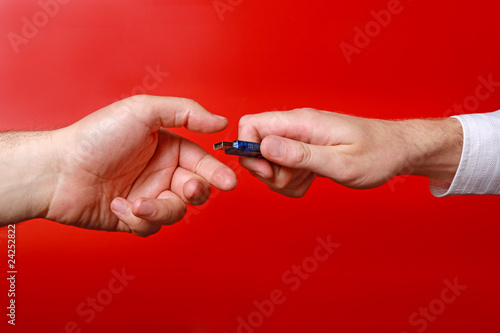 Man's hands with memory stick