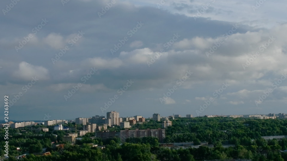 Zoom out city with cloud time lapse Zoom out city with cloud time lapse