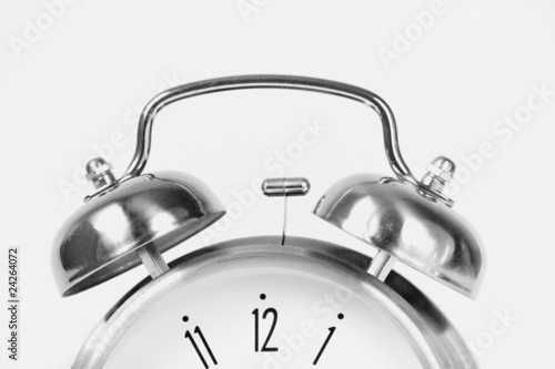 classical retro ring clock at white background