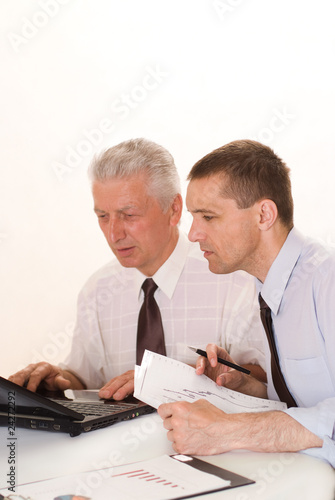 Two businessmen working together