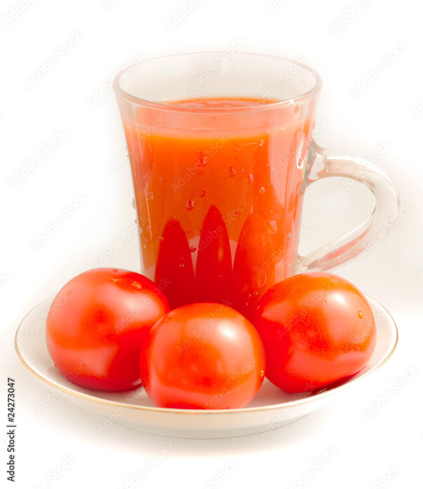 tomato juice and tomato on a saucer three tomato juice and tomato on a saucer three