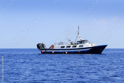 trawler boat working in mediterranean offshore