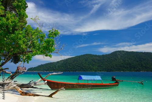 Longtail boat on the beach of Rawi island, Thailand