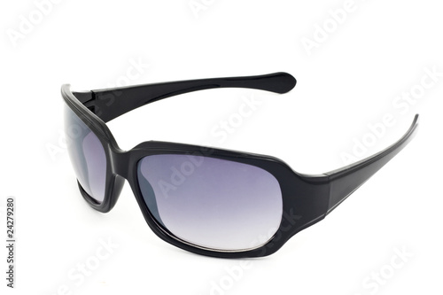 Black sunglasses with tinted lenses on white background