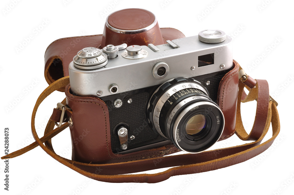 Isolated used old-fashioned film photo-camera in leather case