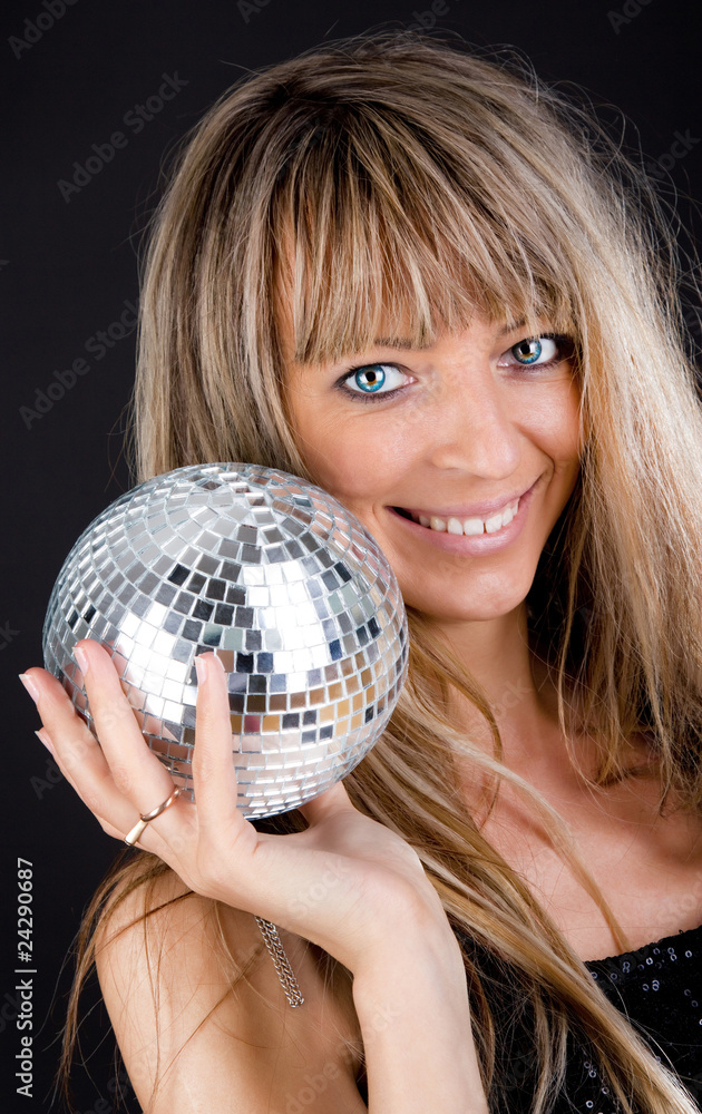 Smiling blonde holding a sphere Smiling blonde holding a sphere