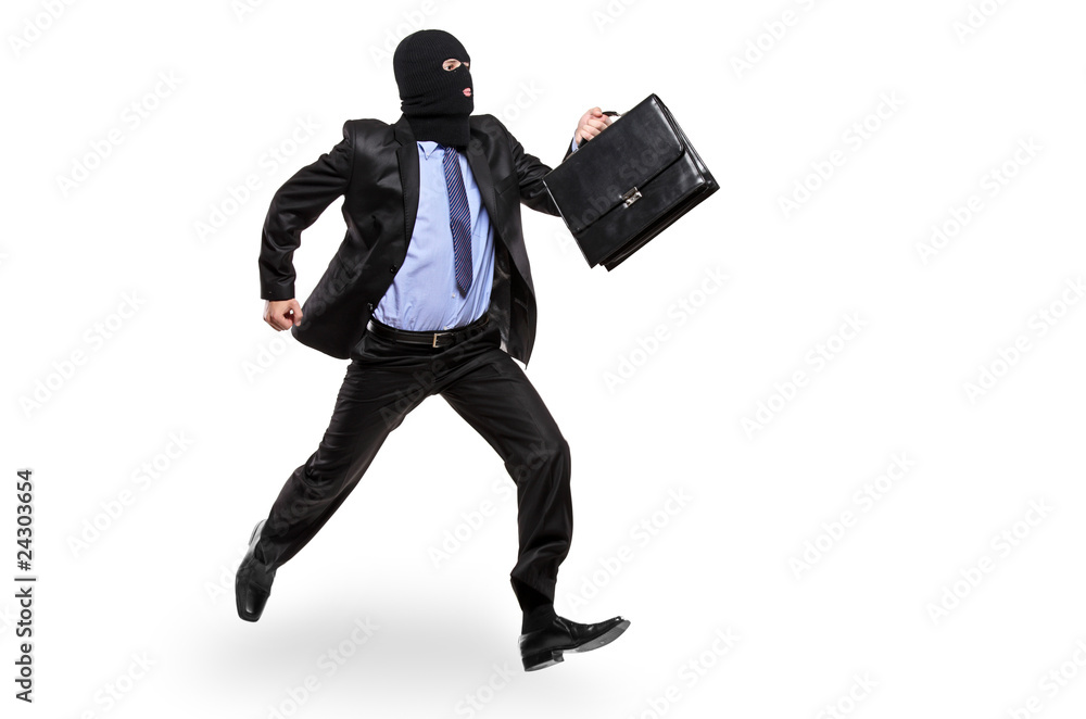 A burglar with robbery mask running away A burglar with robbery mask running away