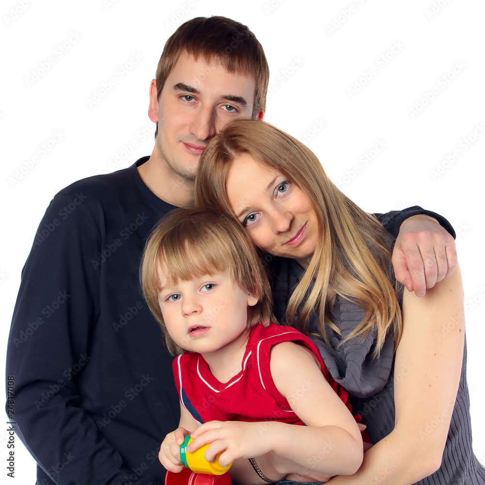Happy family. Father, mother and child. Over white background Happy family. Father, mother and child. Over white background