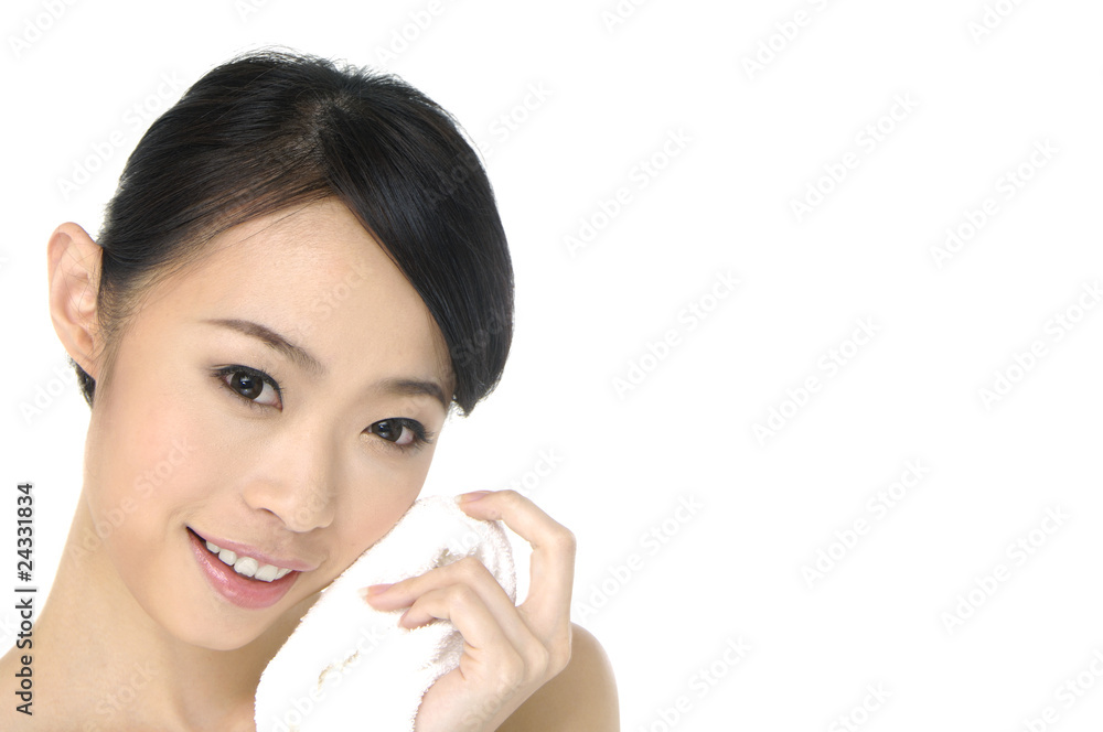 woman holding towel with health skin of face woman holding towel with health skin of face