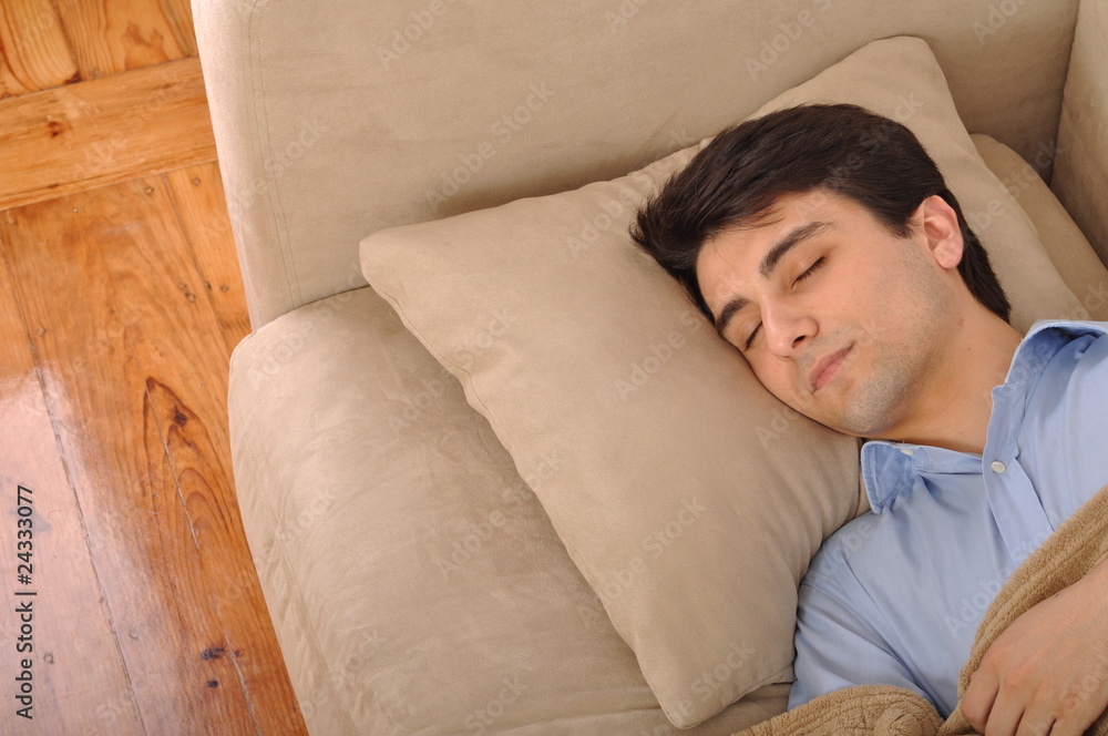 Man sleeping on the couch Man sleeping on the couch