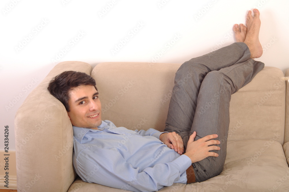 Man relaxing on the couch Man relaxing on the couch
