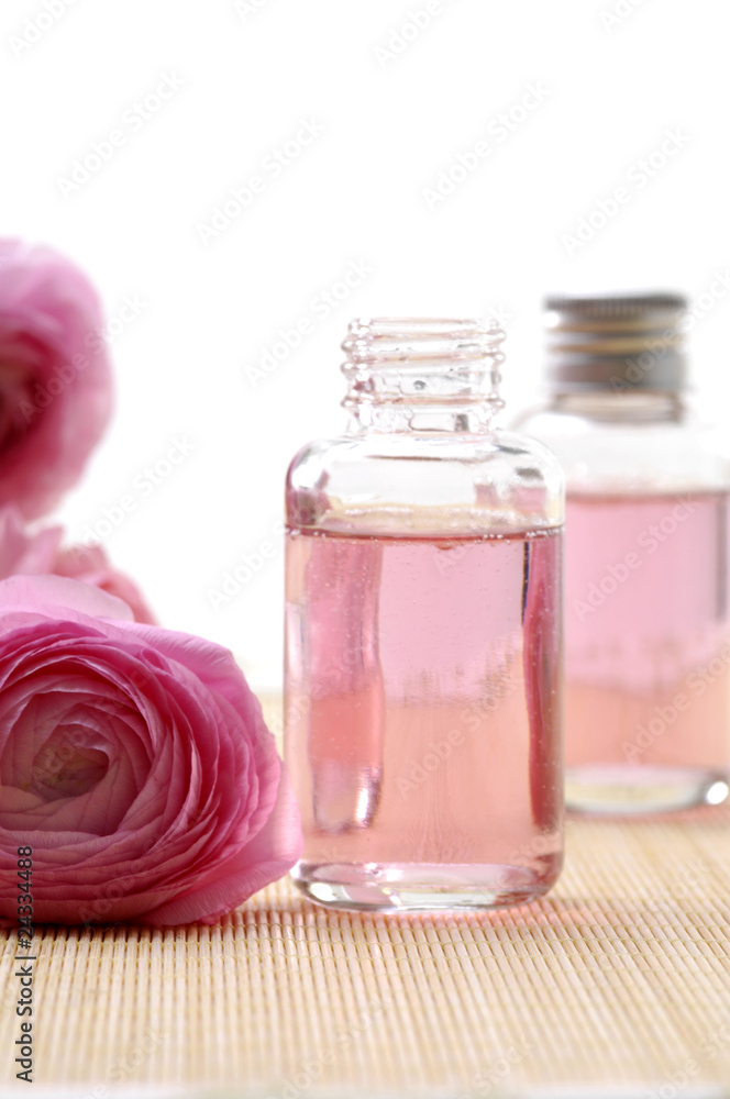 Spa concept- dahlia flower and spa liquid Spa concept- dahlia flower and spa liquid