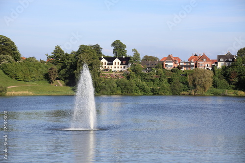 Photography lake and fountain of royal Frederiksborg Castle in Denmark