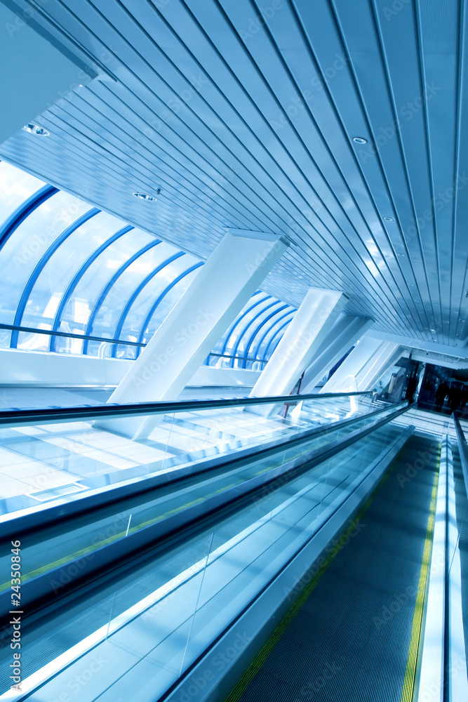 moving escalator in airport moving escalator in airport