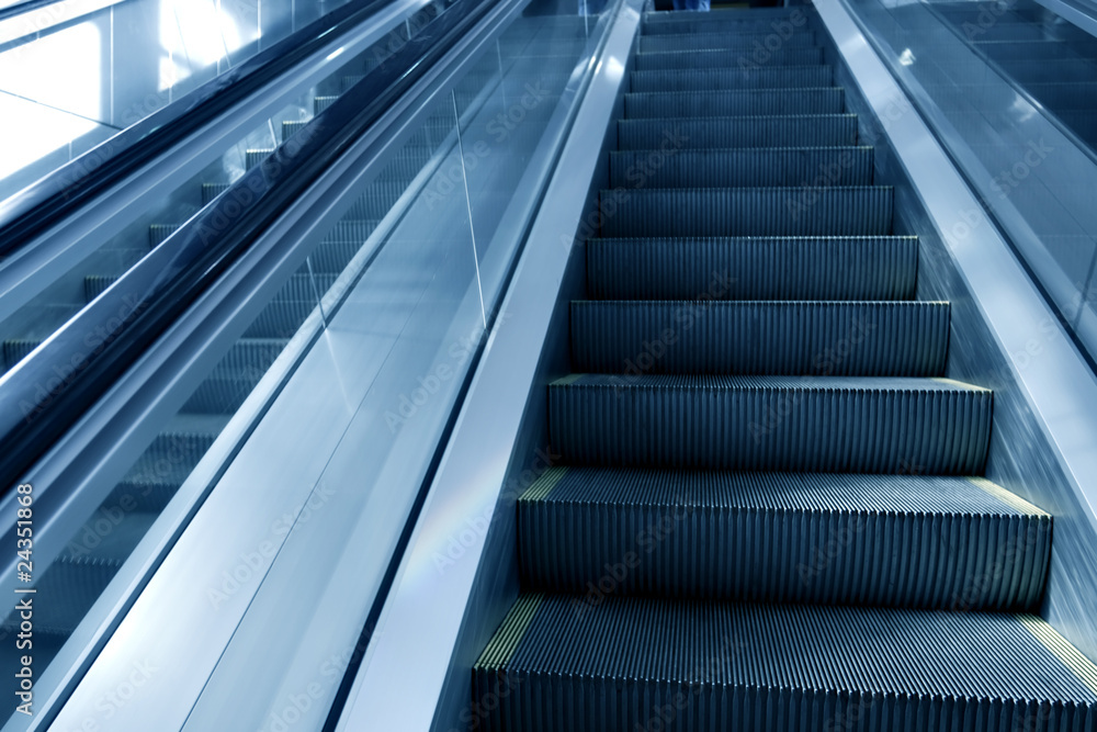 moving escalator in airport moving escalator in airport