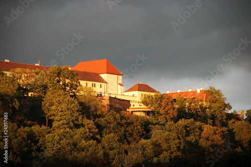 Castle and fortification on the hill in sunset light photo