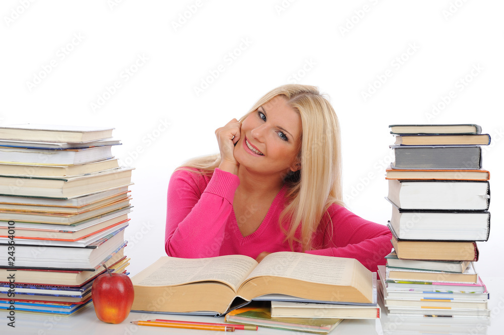 young pretty smart woman with lots of books reading and study. young pretty smart woman with lots of books reading and study.