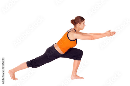 Woman Practicing Yoga Exercise © Artur Bogacki