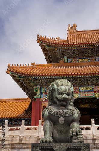 Beijing Forbidden City: lion against the corner of a roof.
