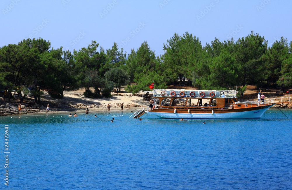 people relaxing cleopatra island turkey