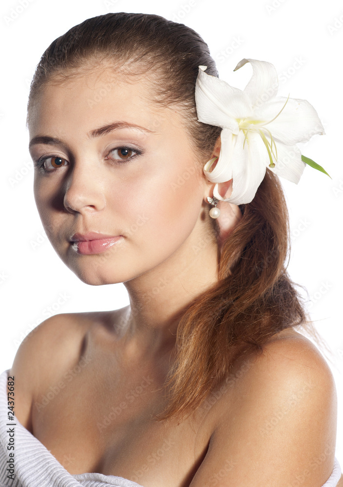 Portrait of beautiful lady with flower on white
